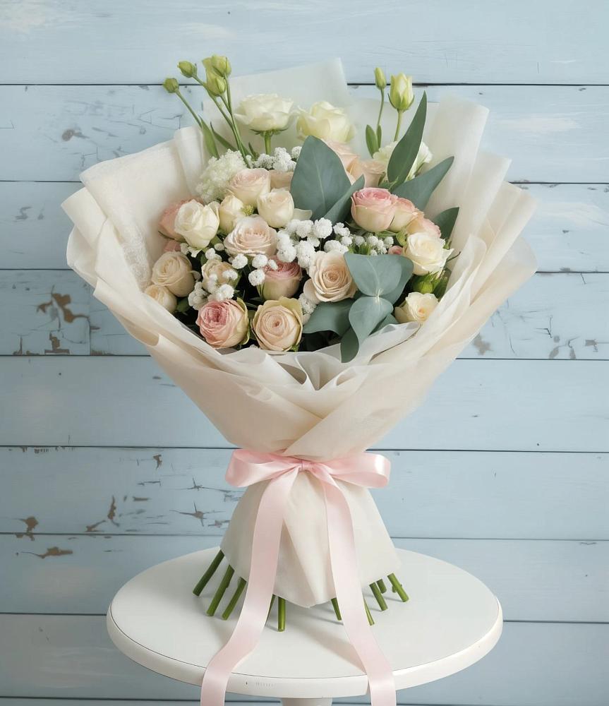 Букет цветов из: Розы и Лизиантусы в Южный